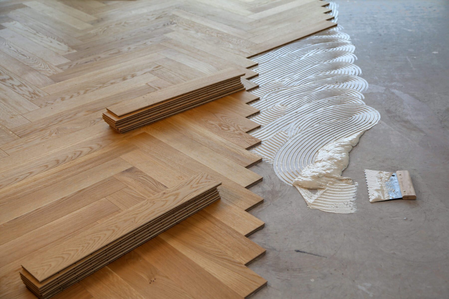 worker-laying-parquet-flooring-and-installing-wood-2025-02-11-18-30-02-utc