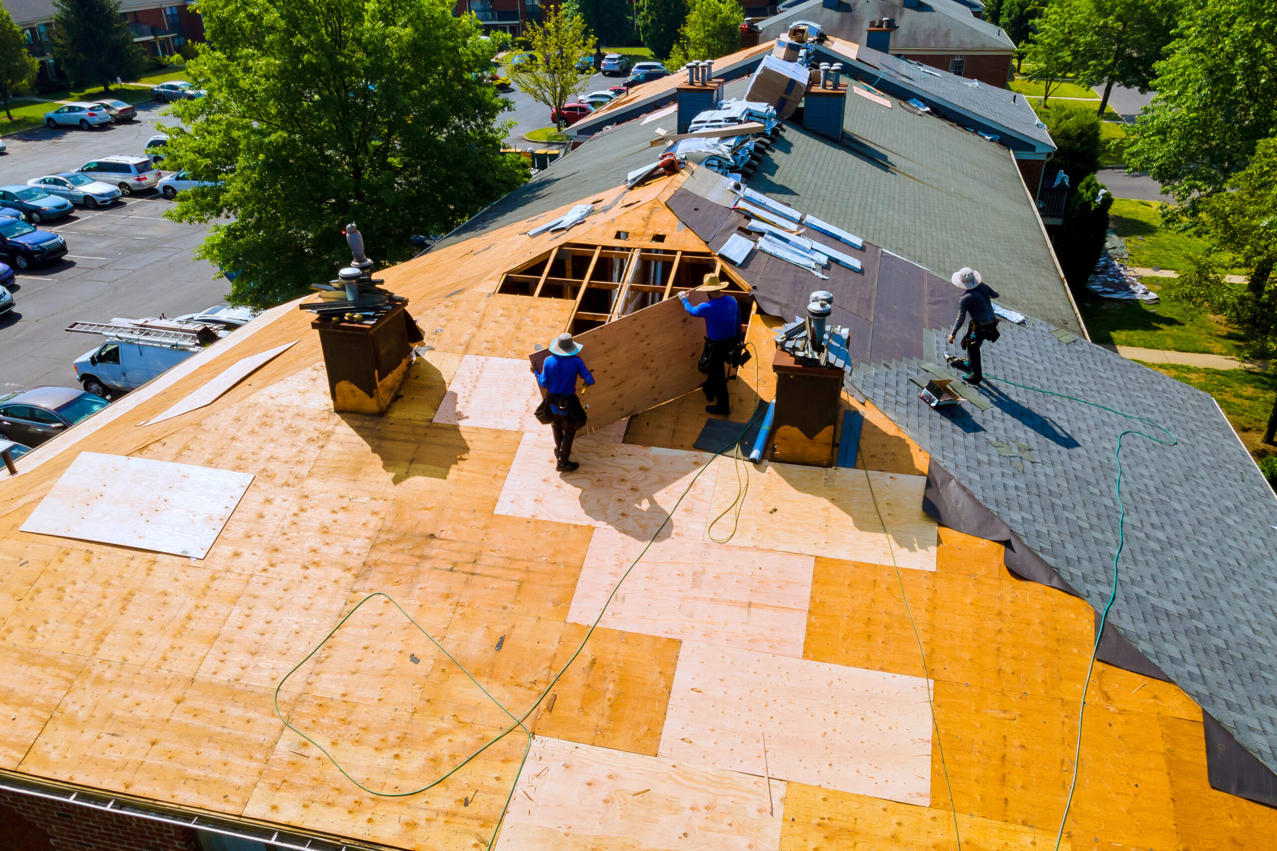 Replace old asphalt bitumen shingles on a house roof in order to repair roof
